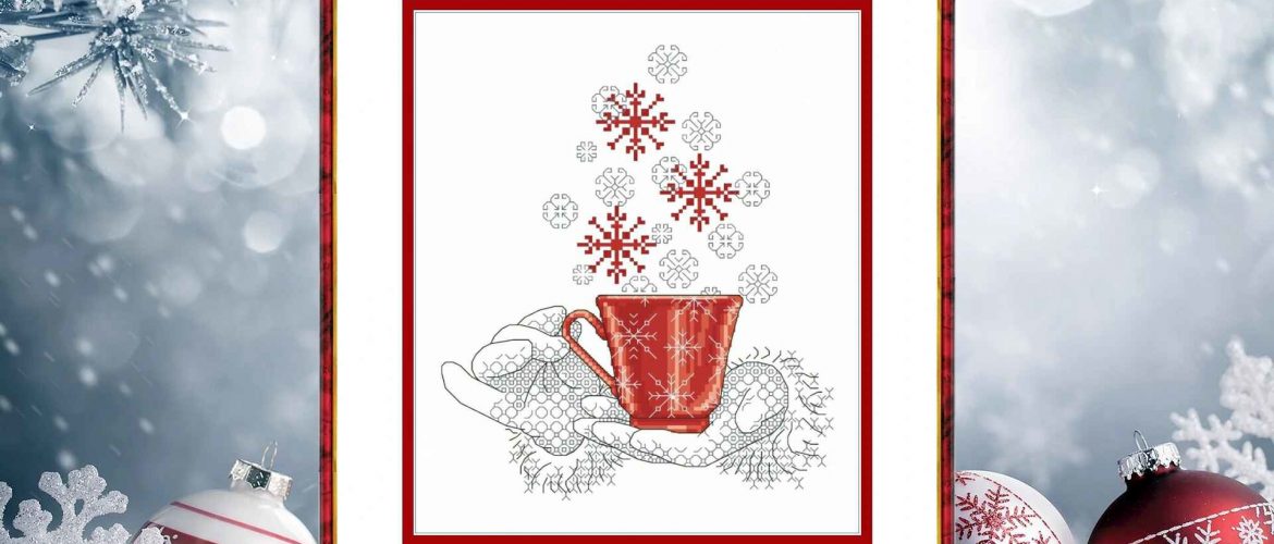 Cross stitch pattern of a red cup in hands with falling snowflakes, cozy winter embroidery design on white background.